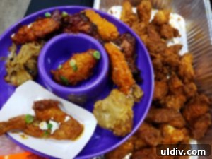 Celebrate 20 Years of Wing Perfection at Chicagos Best Wingfest 10 A plate filled with various chicken wings during tasting