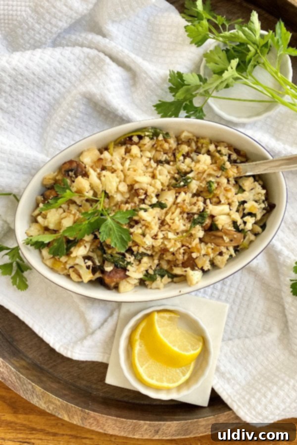 Easy 20-Minute Cauliflower Rice Pilaf 2 Large serving of flavorful cauliflower rice pilaf with herbs