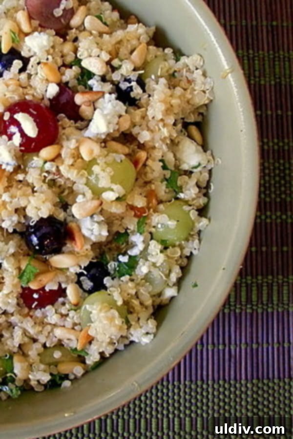 Tropical Quinoa Salad with Berries and Pine Nuts 2 A cool, refreshing, and nutritious fruit quinoa salad with grapes, blueberries, pine nuts, and an apple cider vinaigrette. Perfect for a healthy side dish or light meal.