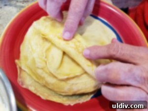 Nielsen-Massey Vanilla Dreams: My Spring Crêpe Casserole Recipe 11 Rolled crêpes ready for baking in a buttered dish