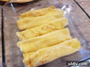 Nielsen-Massey Vanilla Dreams: My Spring Crêpe Casserole Recipe 12 Layering rolled crêpes in a baking dish