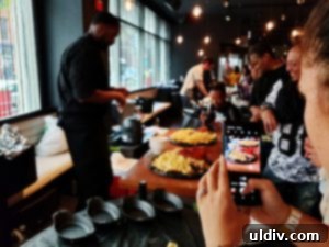 My Culinary Journey Judging the Midwest Chef Battle 12 Chef Teren Green expertly handling a large lobster