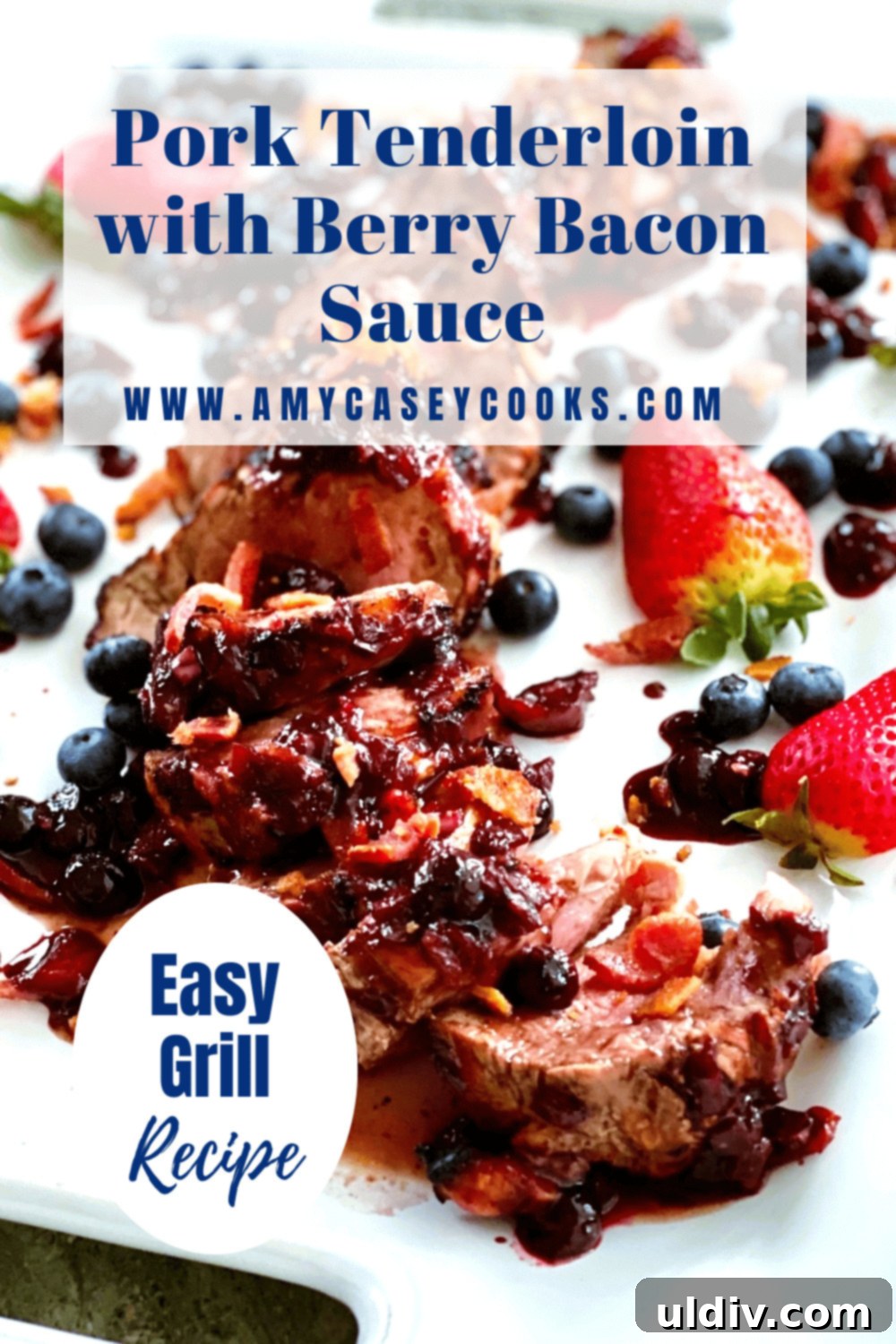 Berry Bacon Glazed Grilled Pork Tenderloin 7 A beautifully presented plate with sliced grilled pork tenderloin, abundant berry bacon sauce, and fresh herbs.