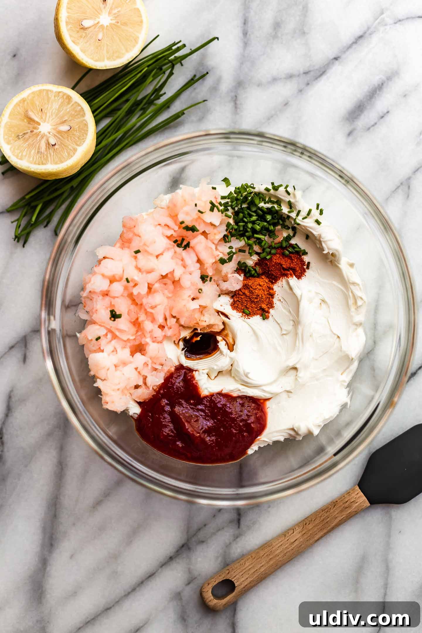 Creamy Pink Shrimp Dip Recipe for Parties and Appetizers 3 Pink shrimp dip ingredients in a bowl.