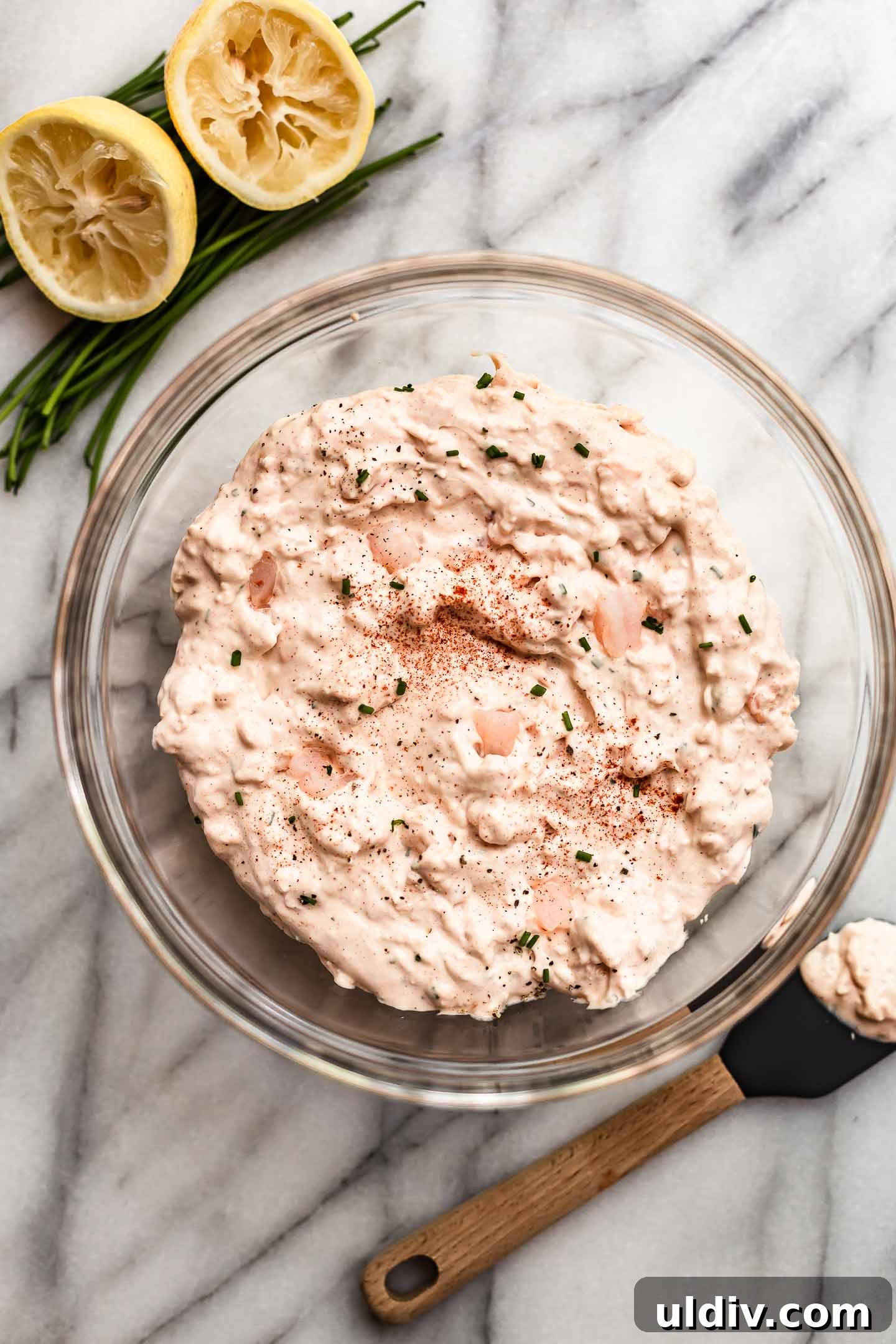 Creamy Pink Shrimp Dip Recipe for Parties and Appetizers 4 pink shrimp dip mixed in a bowl.