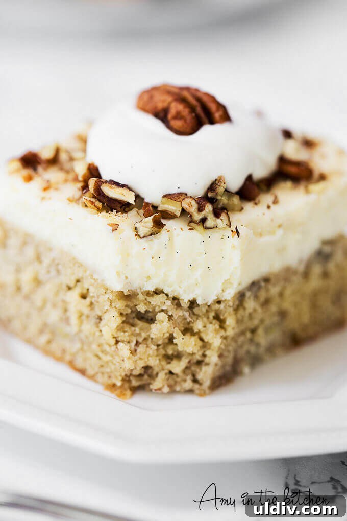 A slice of banana cake on a plate.