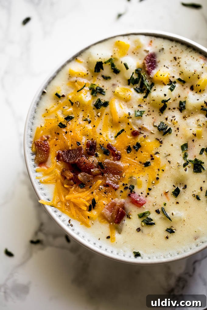 Bowl of Instant Pot Corn Chowder Instant Pot Corn Chowder in a bowl with bacon.