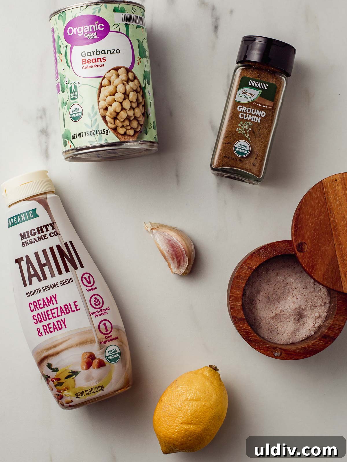 Oil-Free Hummus Recipe: Creamy Chickpea Dip Without Oil 3 Hummus ingredients on a table.