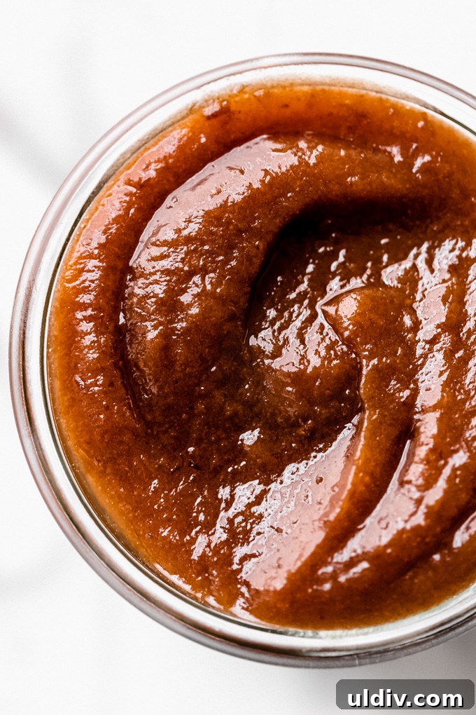 how to make date paste with only two ingredients A closeup photo of date paste in a jar.