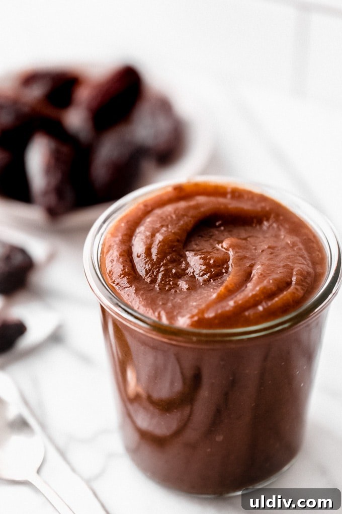 How to Make Smooth Homemade Date Paste for Baking and Snacks 2 Date paste in a glass jar.
