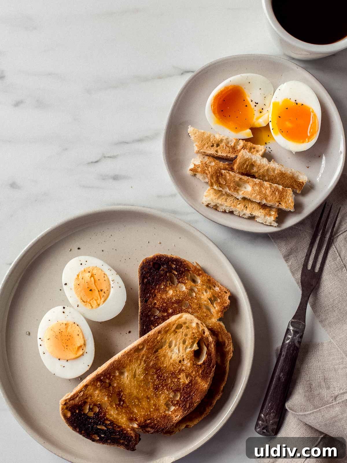 Instant Pot: How to Make Perfect Hard and Soft Boiled Eggs 2 Hard and soft boiled eggs with toast on two plates.