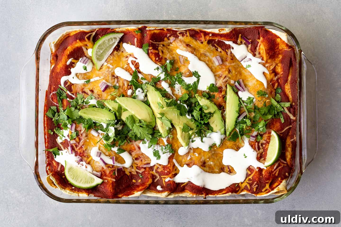 Sweet Potato Enchilada Casserole Recipe for Cozy Weeknight Meals 4 A sweet potato enchiladas topped with avocado and cilantro.