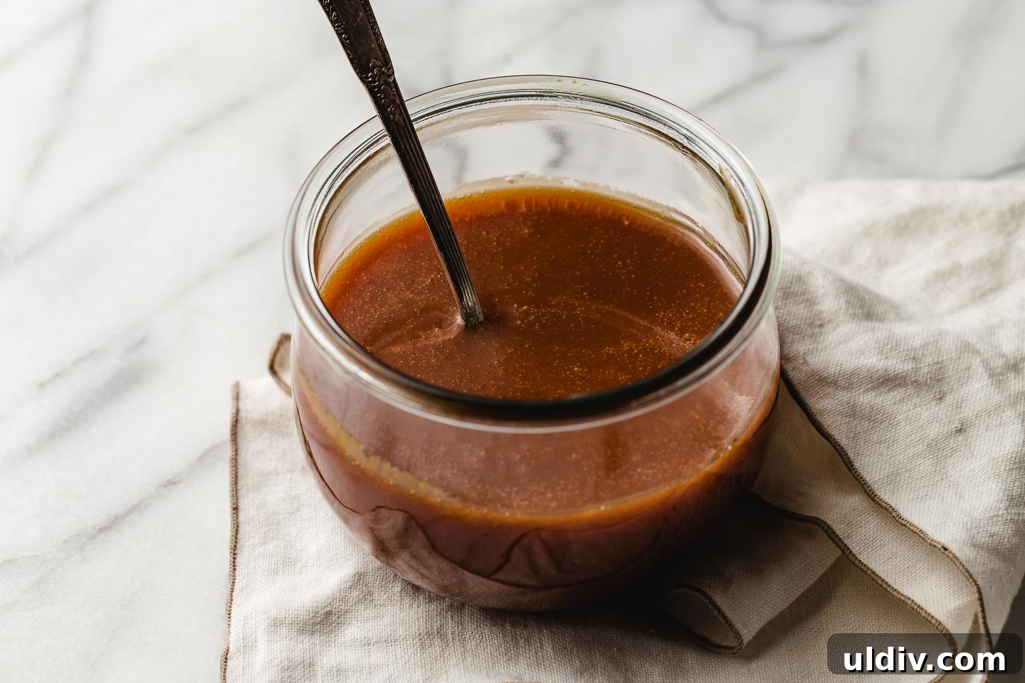 Homemade Salted Caramel Sauce Recipe for Smooth, Gooey Results 6 A weck jar filled with homemade salted caramel.