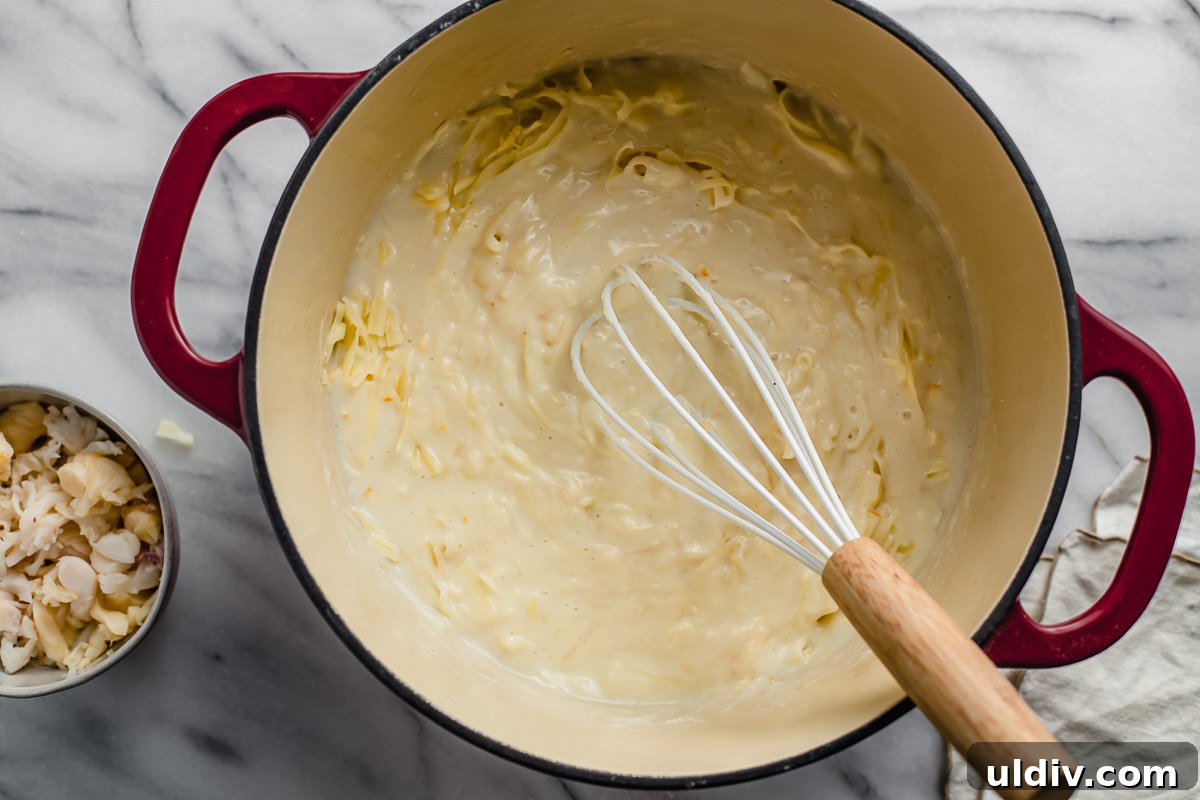 Creamy Lobster Macaroni and Cheese with Parmesan Crust 5 Roux for mac and cheese in a stockpot.
