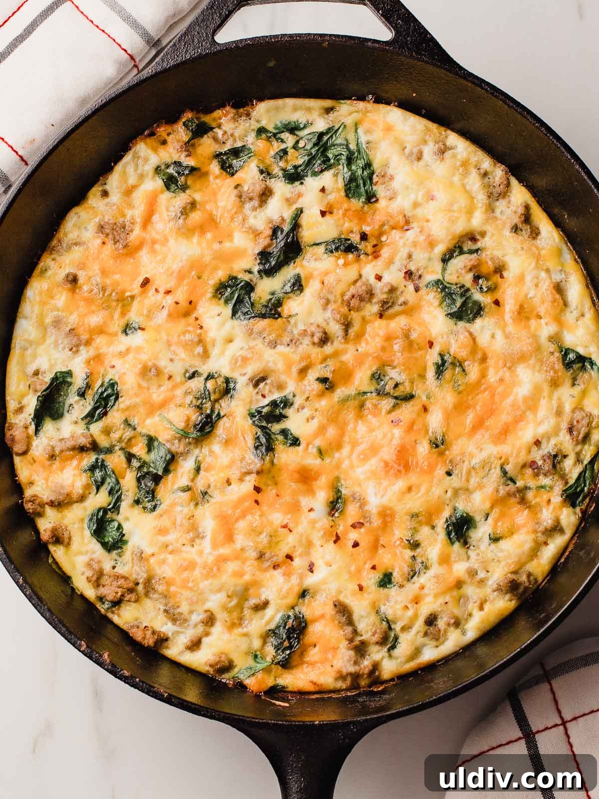 Turkey Sausage and Spinach Frittata Recipe for Weeknight Breakfast 2 Turkey Sausage Spinach Frittata in a cast iron skillet.