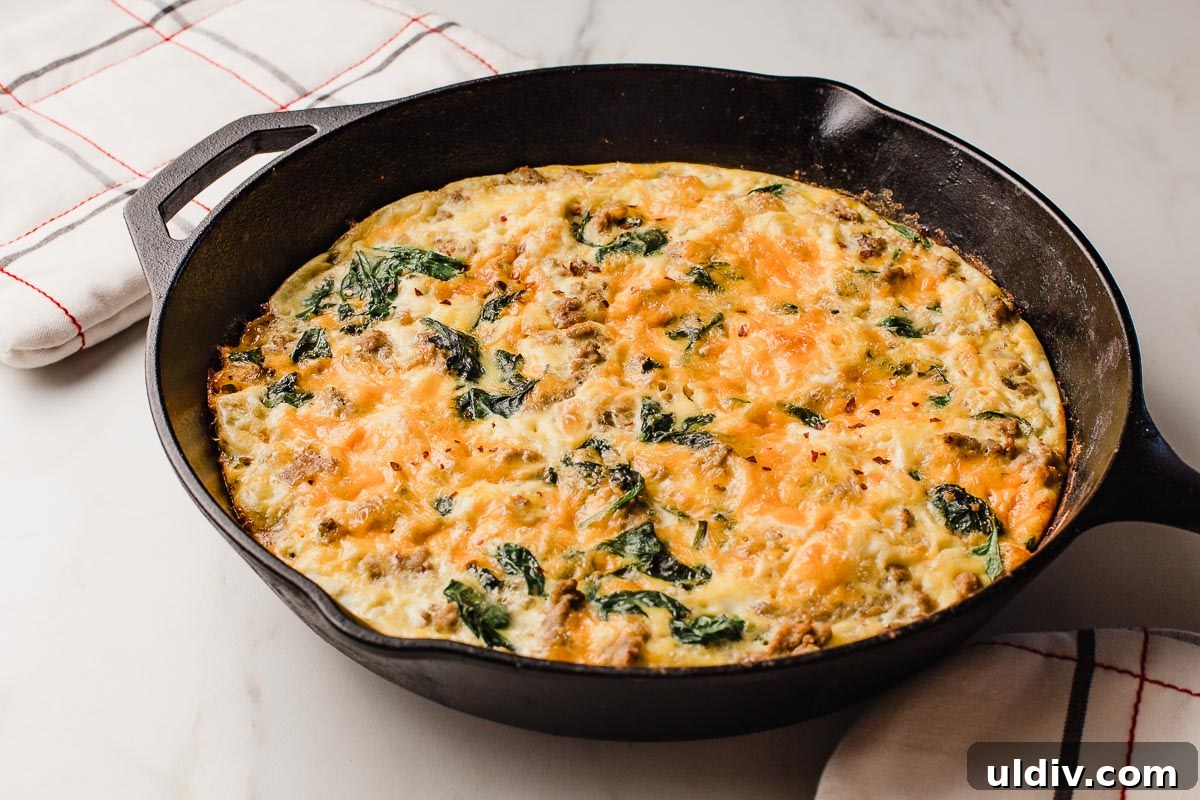 Turkey Sausage and Spinach Frittata Recipe for Weeknight Breakfast 6 A baked turkey sausage and spinach frittata on a table.