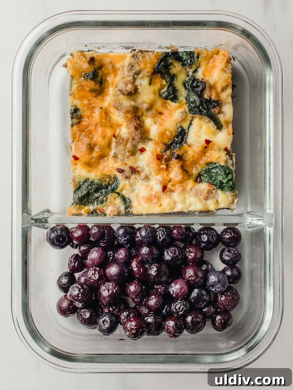 Turkey Sausage and Spinach Frittata Recipe for Weeknight Breakfast 7 Turkey sausage and spinach frittata blueberries meal prep bowl.