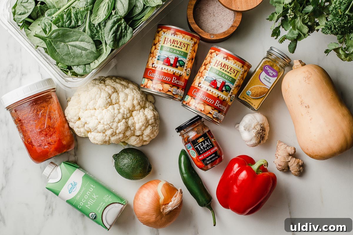 Instant Pot Chickpea Curry Recipe — Quick Weeknight Dinner 3 Chickpea Cauliflower Curry ingredients on a table.