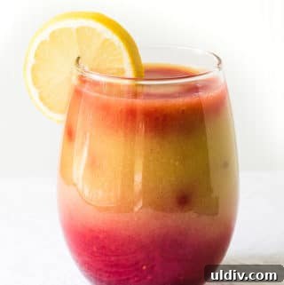 strawberry mango banana smoothie in a glass