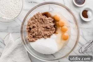 Bowl with sugar and eggs.