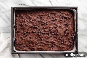 Brownie batter in baking dish.